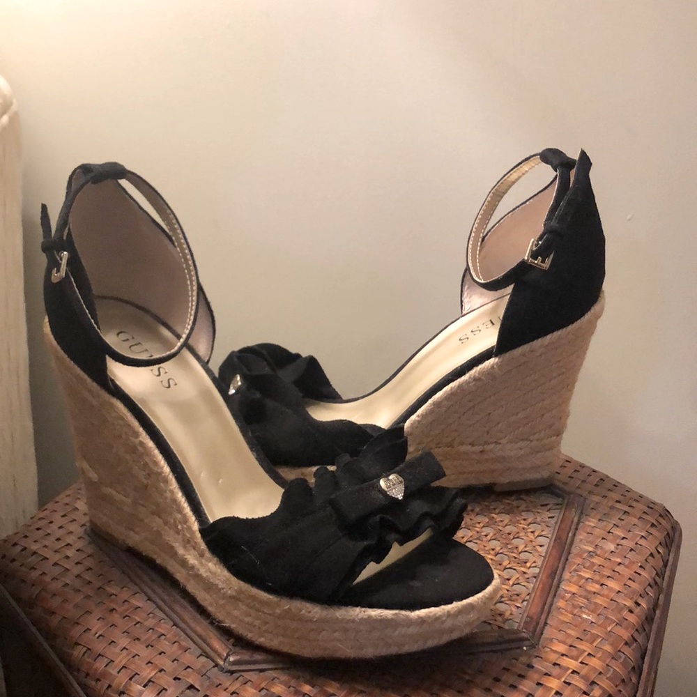 Guess black wedges with heart emblessment size 9